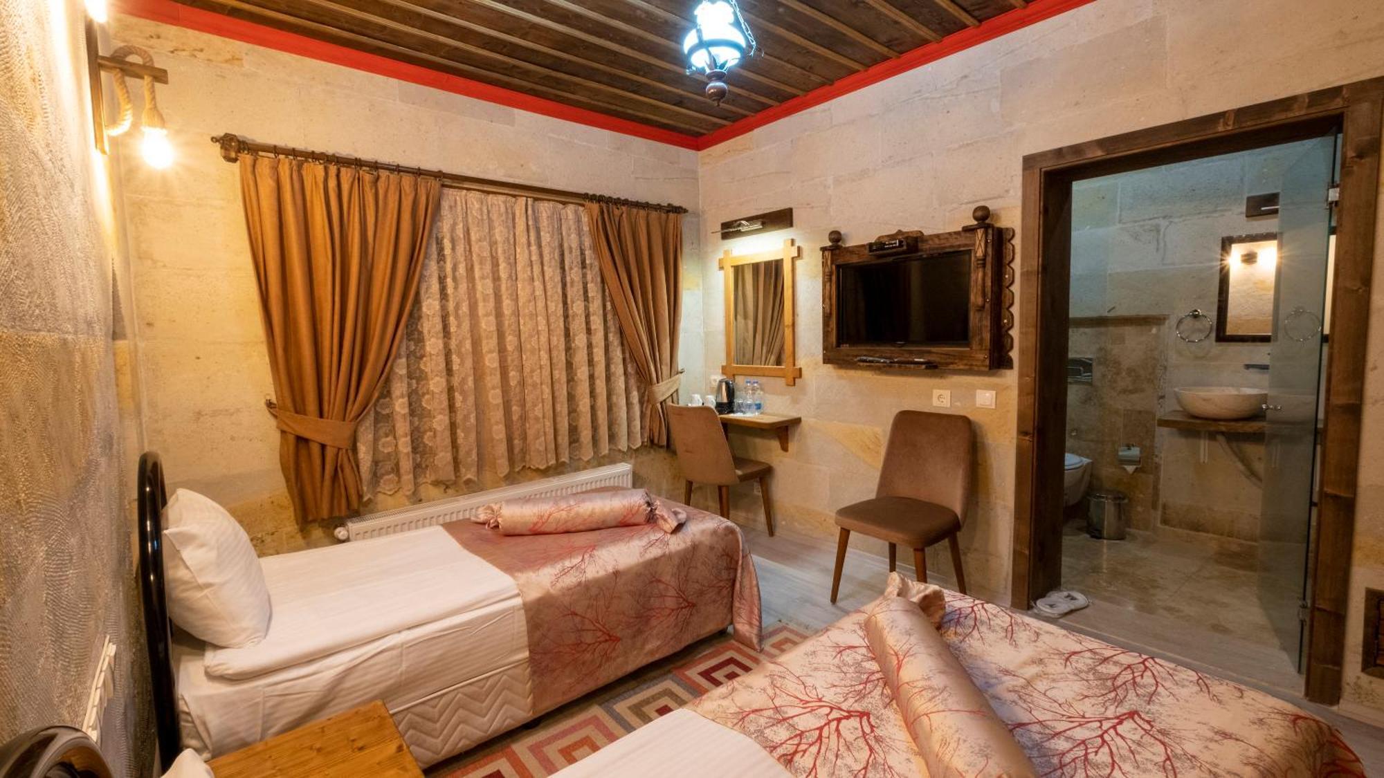 Отель In Stone House Гореме Номер фото