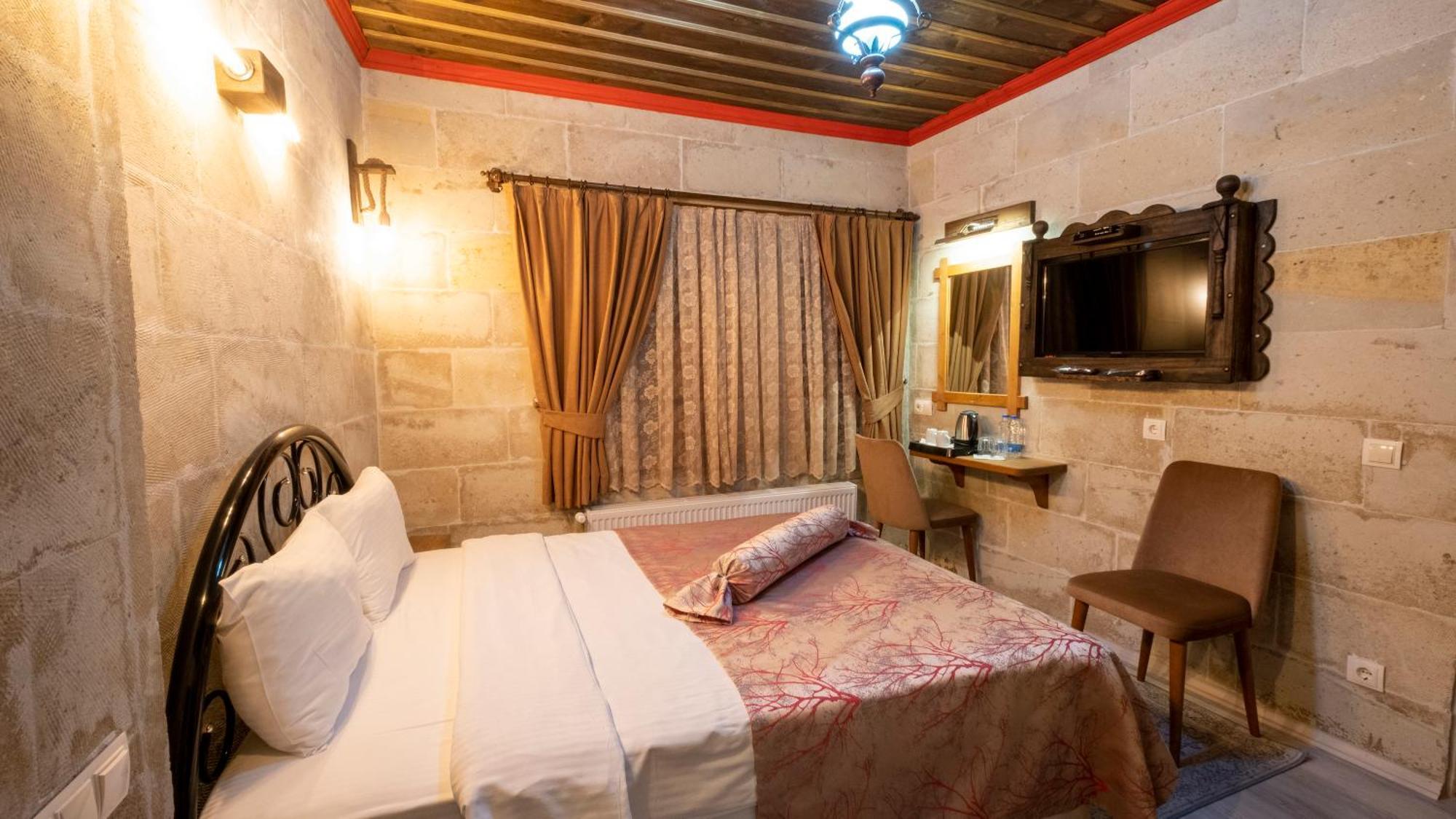 Отель In Stone House Гореме Номер фото